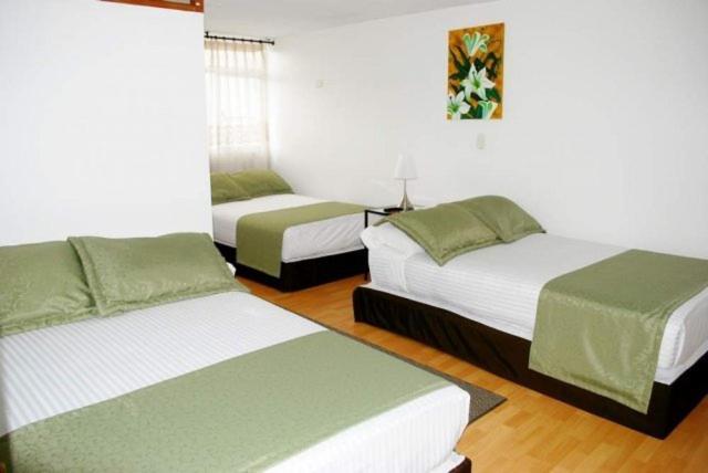Hotel Portal De Milan มานิซาเลส ห้อง รูปภาพ