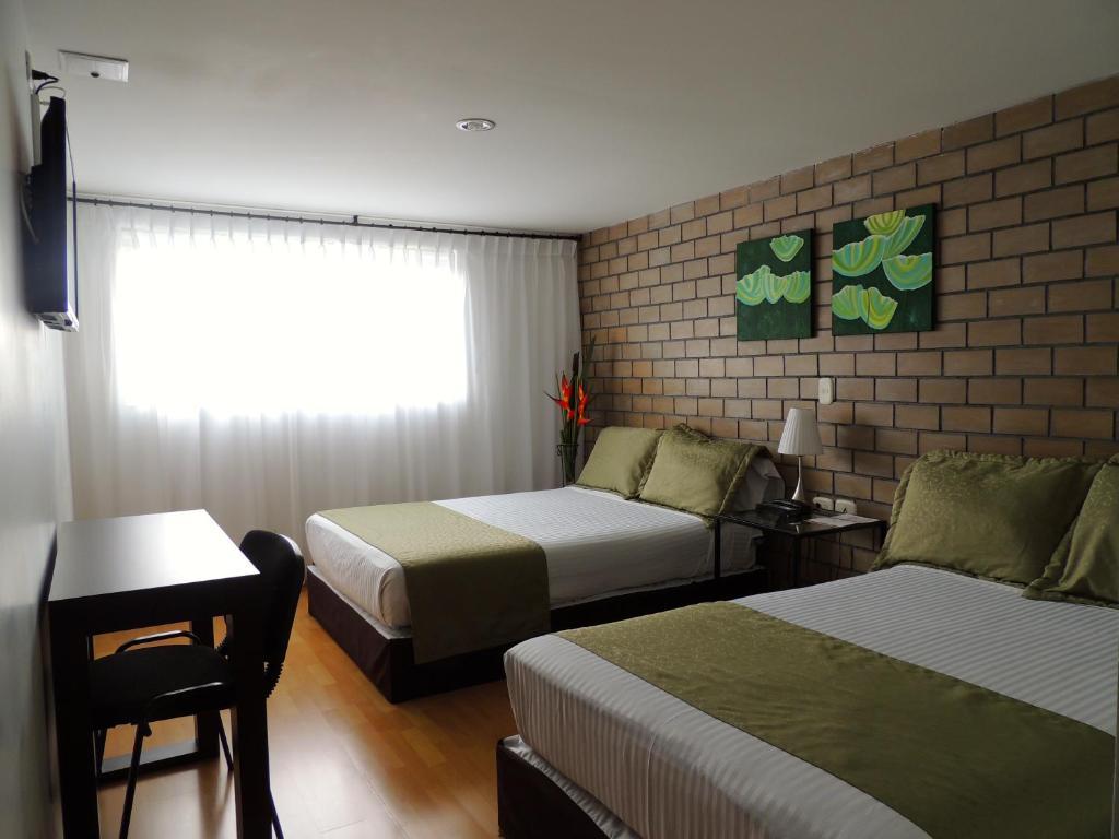 Hotel Portal De Milan มานิซาเลส ห้อง รูปภาพ